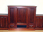 Low stained cherry entertainment center