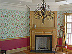 Matching natural cypress mantle in dining room