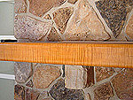 Detail of natural tiger-stripe maple mantle