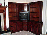 Stained maple corner library unit