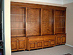 Stained library unit with glass shelves