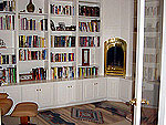 Painted bookcase with storage below